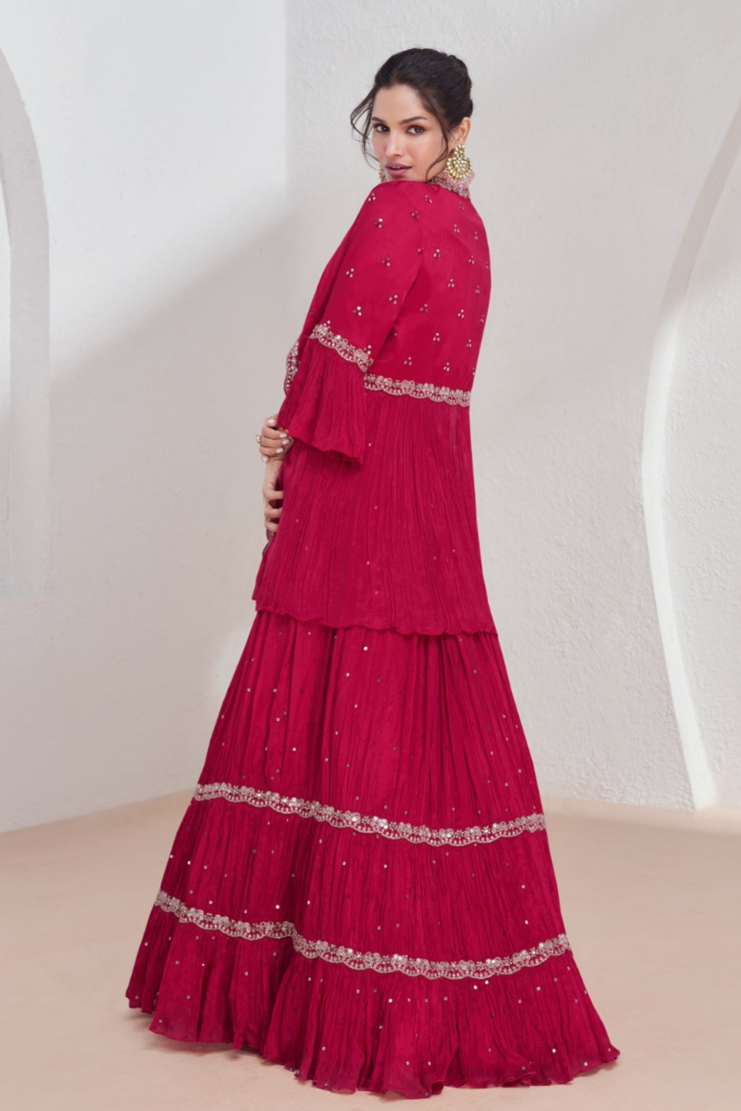 side profile of pink colour wedding lehenga silhouette