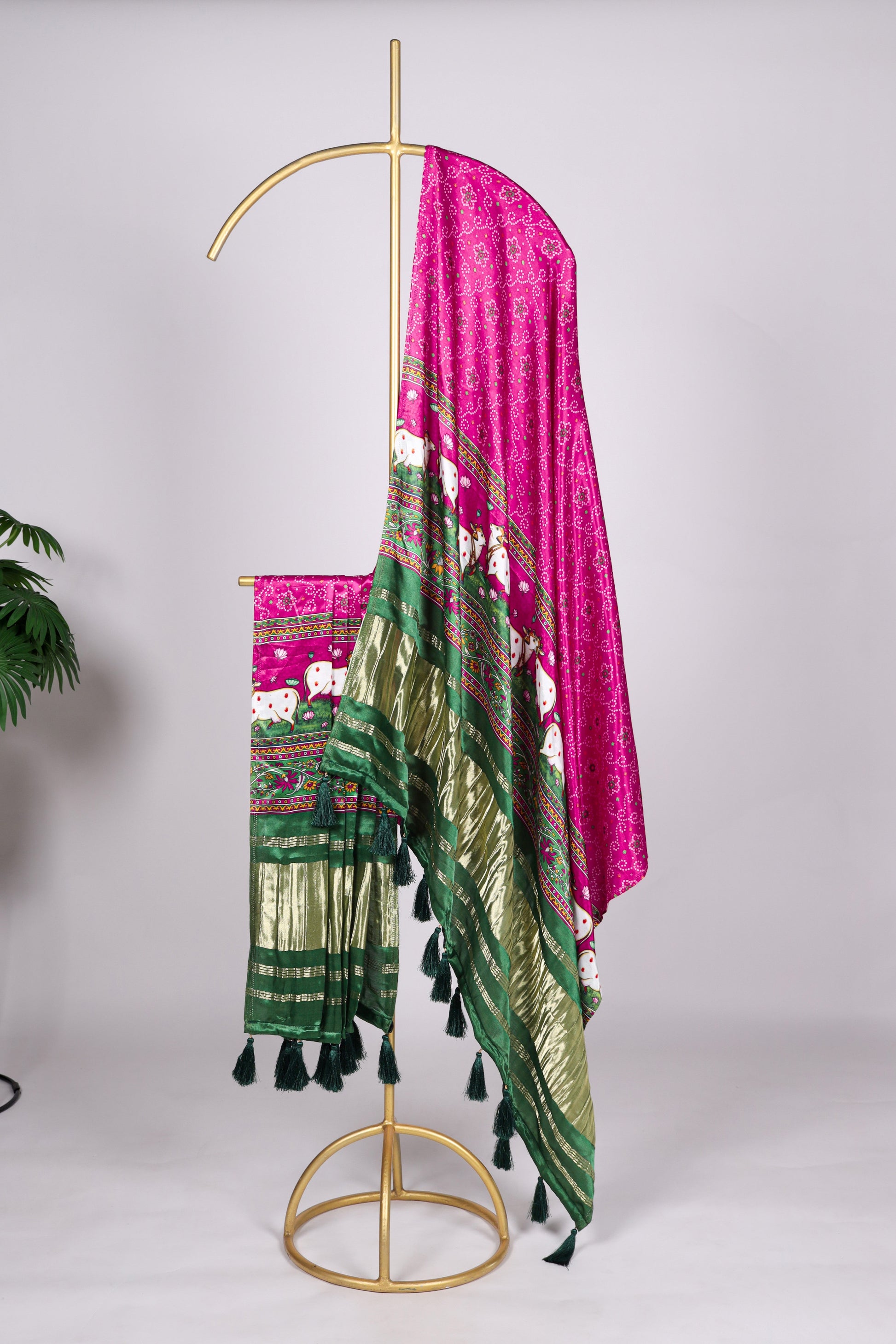 Pink,green dupatta showcasing elegant tassel detailing