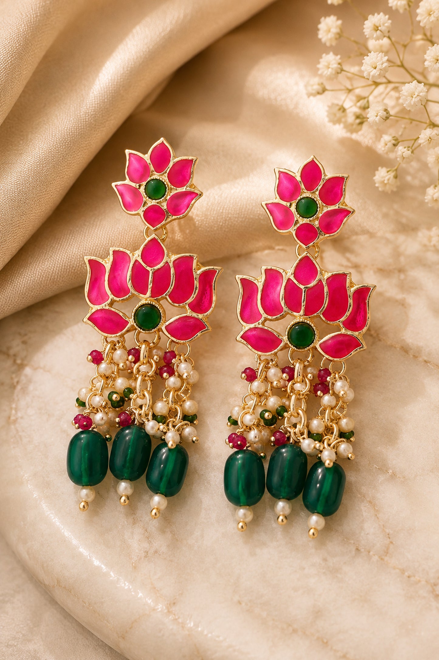 Pink and green floral necklace with circular pendant and layered bead detailing