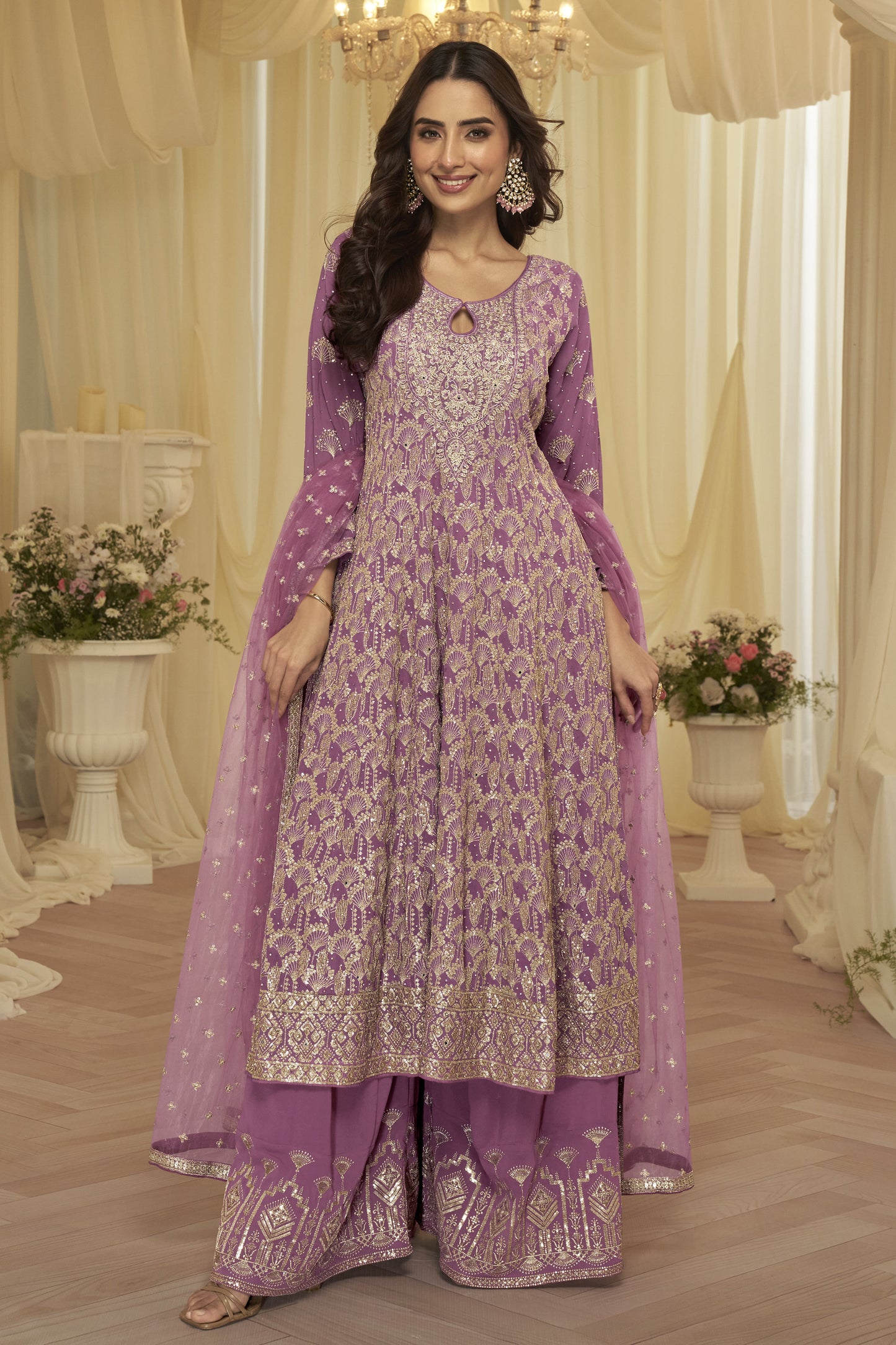 Engagement event styling in pink palazzo dress