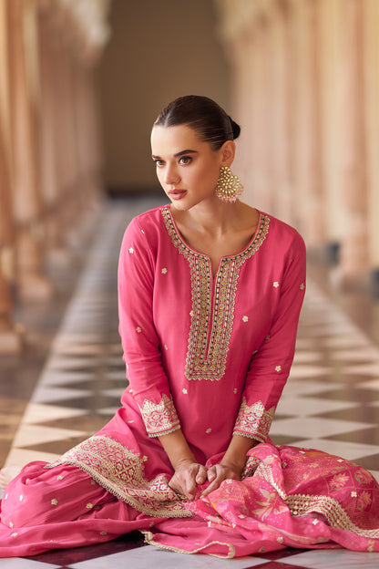 Front view of pink embroidered salwar kameez sharara suit