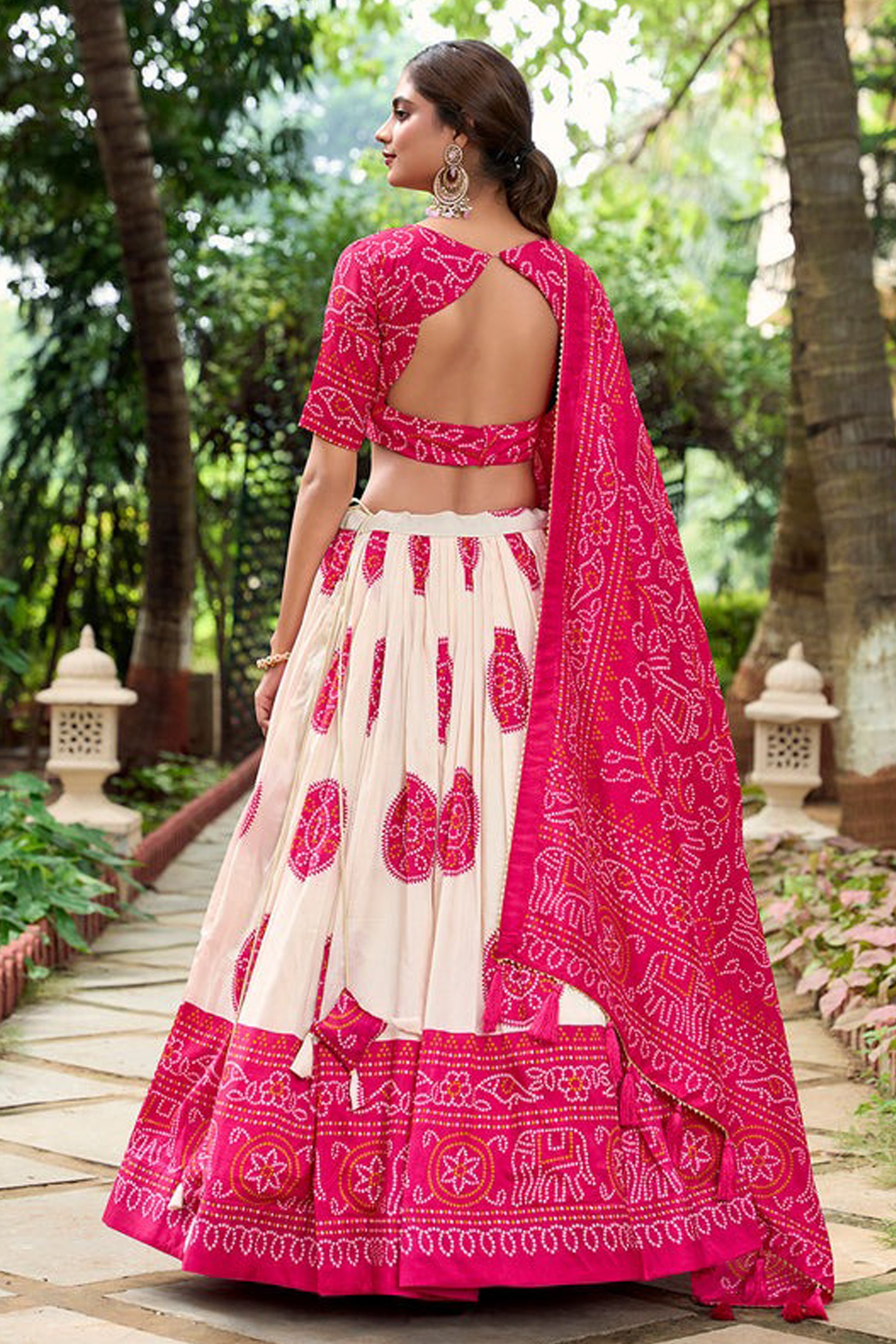 Back view of pink lehenga with coordinated choli design