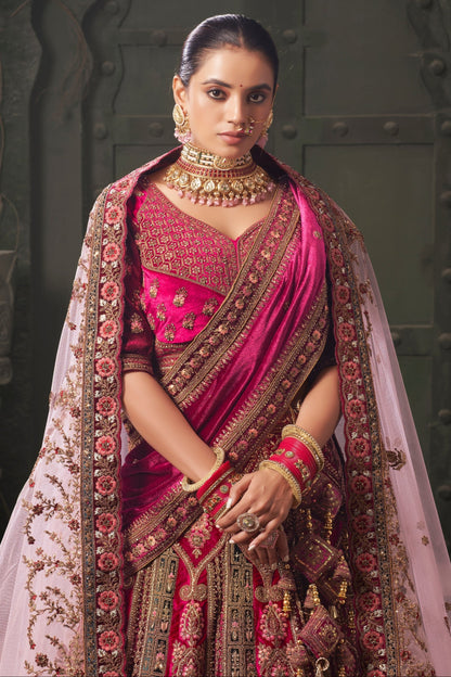 Reception wear lehenga choli in pink velvet fabric