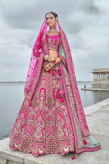 Front view of pink lehenga with heavy embroidery for reception