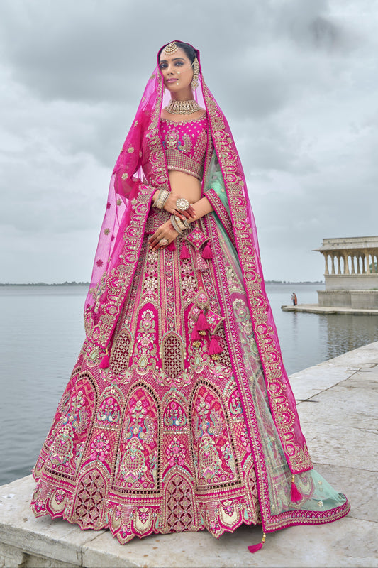 Front view of pink lehenga with heavy embroidery for reception