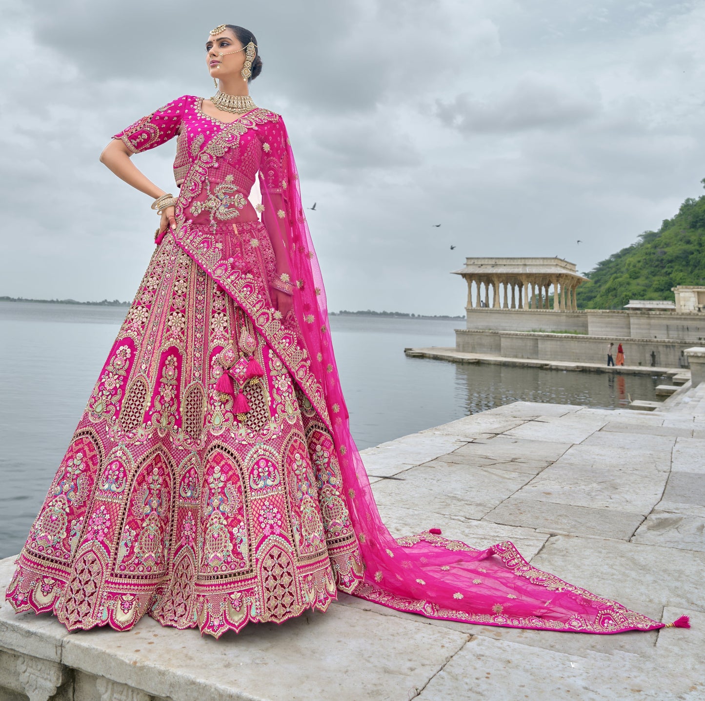 Overhead view of pink lehenga ensemble on display