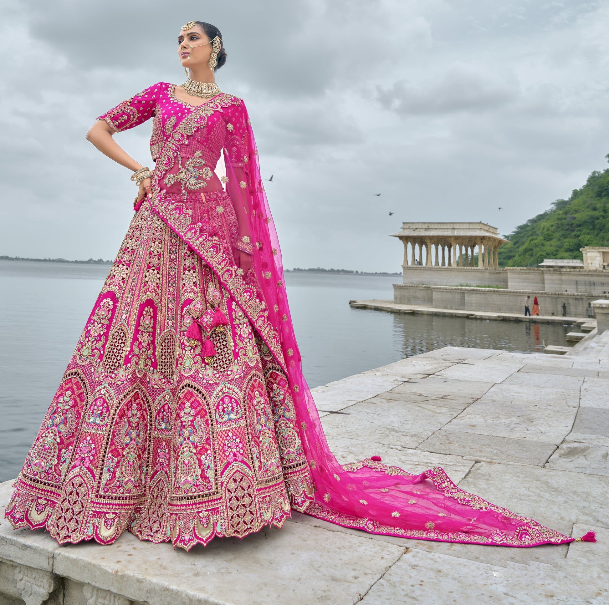 Overhead view of pink lehenga ensemble on display