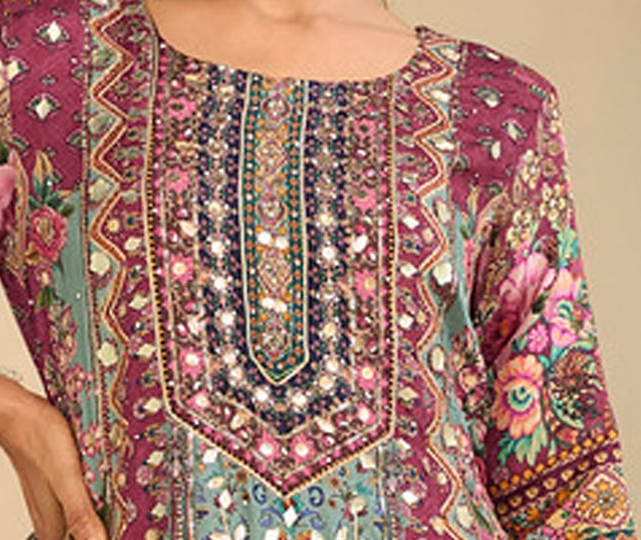 Neckline detail of the pink embroidered outfit