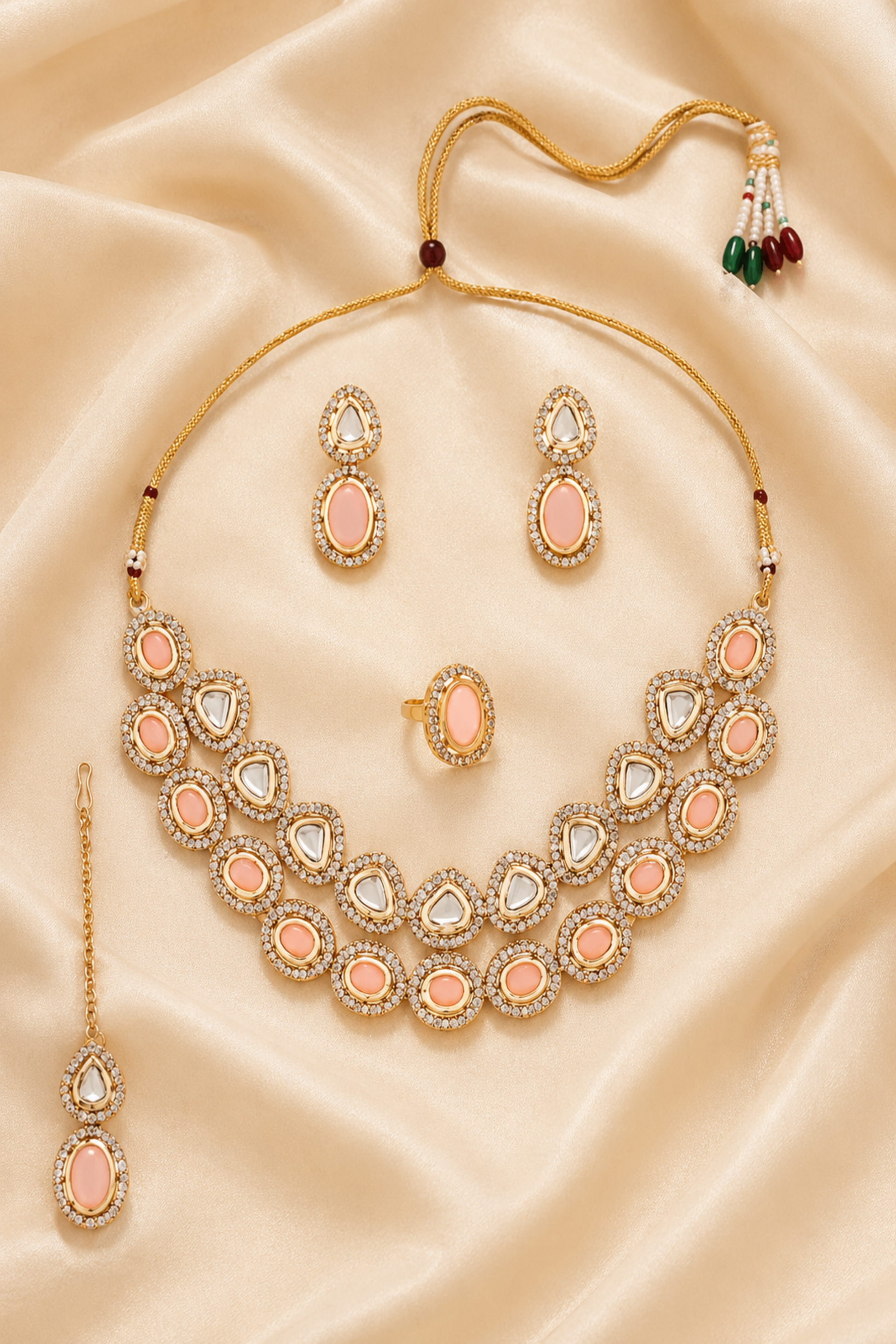 Coordinated gold-tone necklace and earrings with polished finish