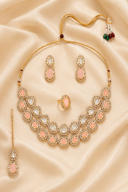 Coordinated gold-tone necklace and earrings with polished finish