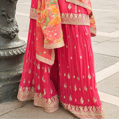 Close view of embroidery pattern on pink outfit