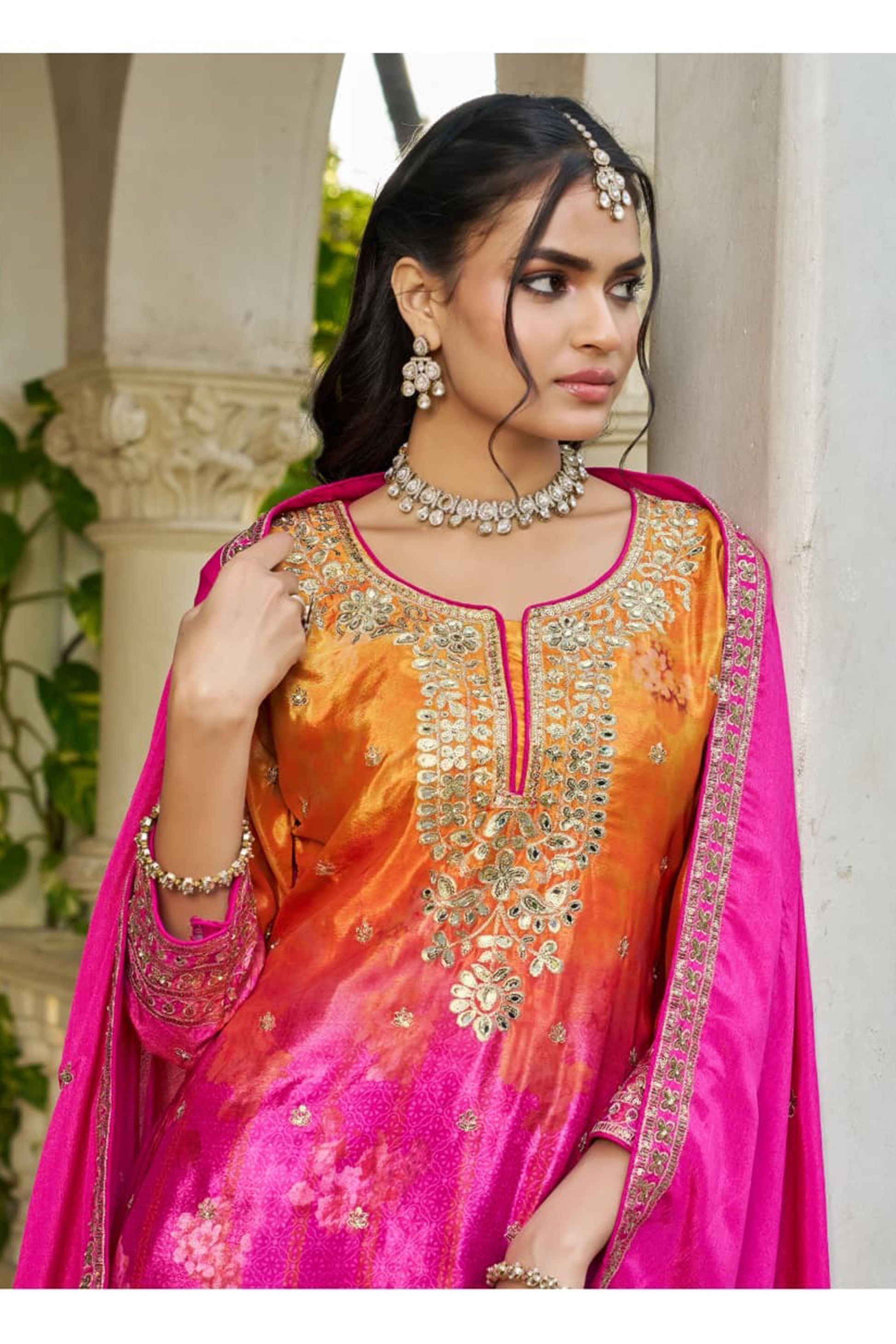 Woman wearing Pink Palazzo Suit at wedding celebration