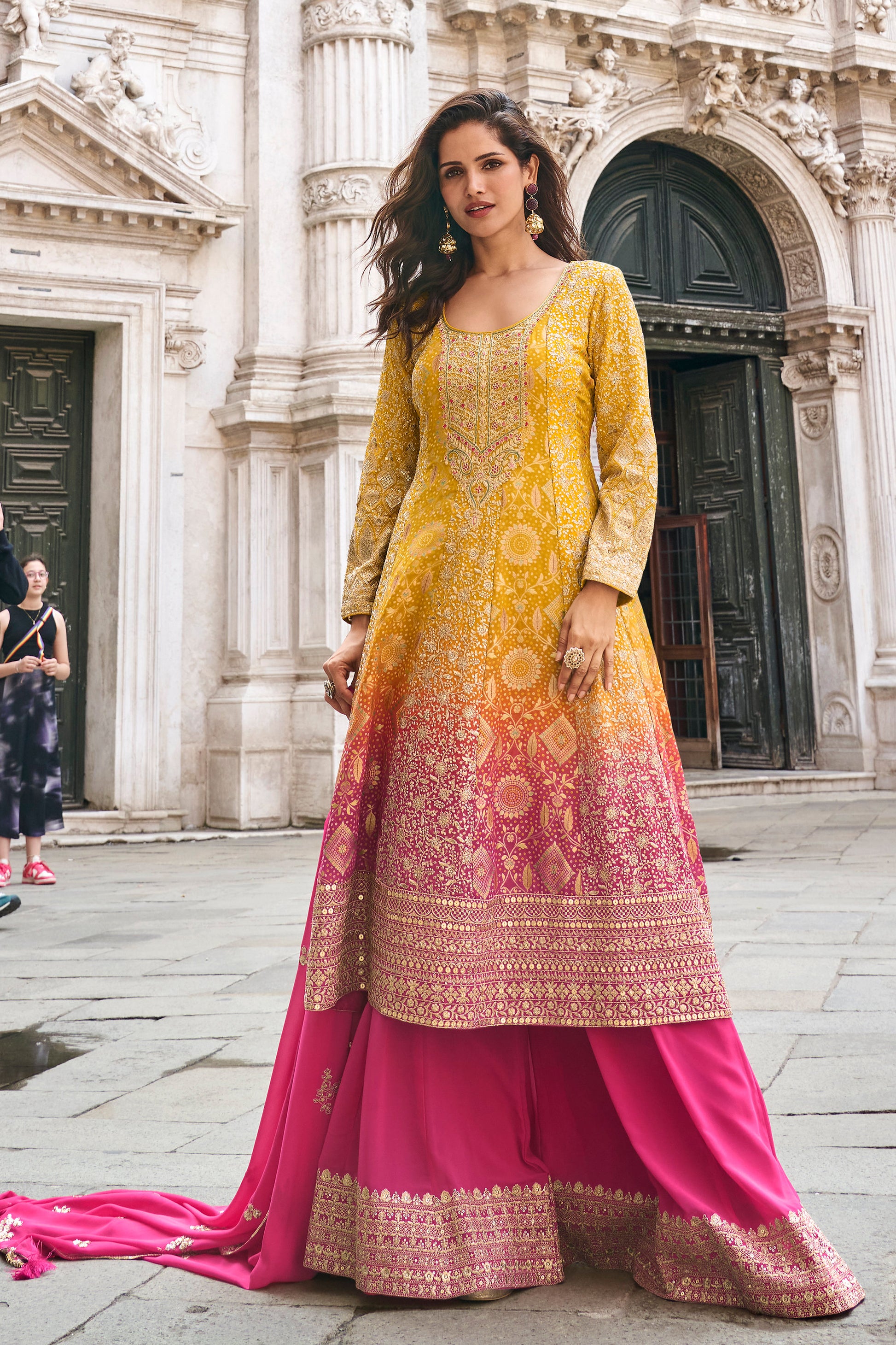 Front view of pink sharara suit set