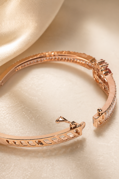 close-up of pink stone bracelet with polished finish