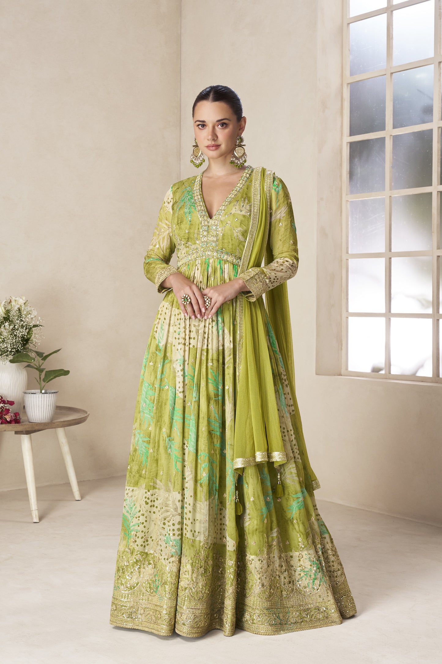 Pistachio green anarkali gown full front view with heavy embroidery