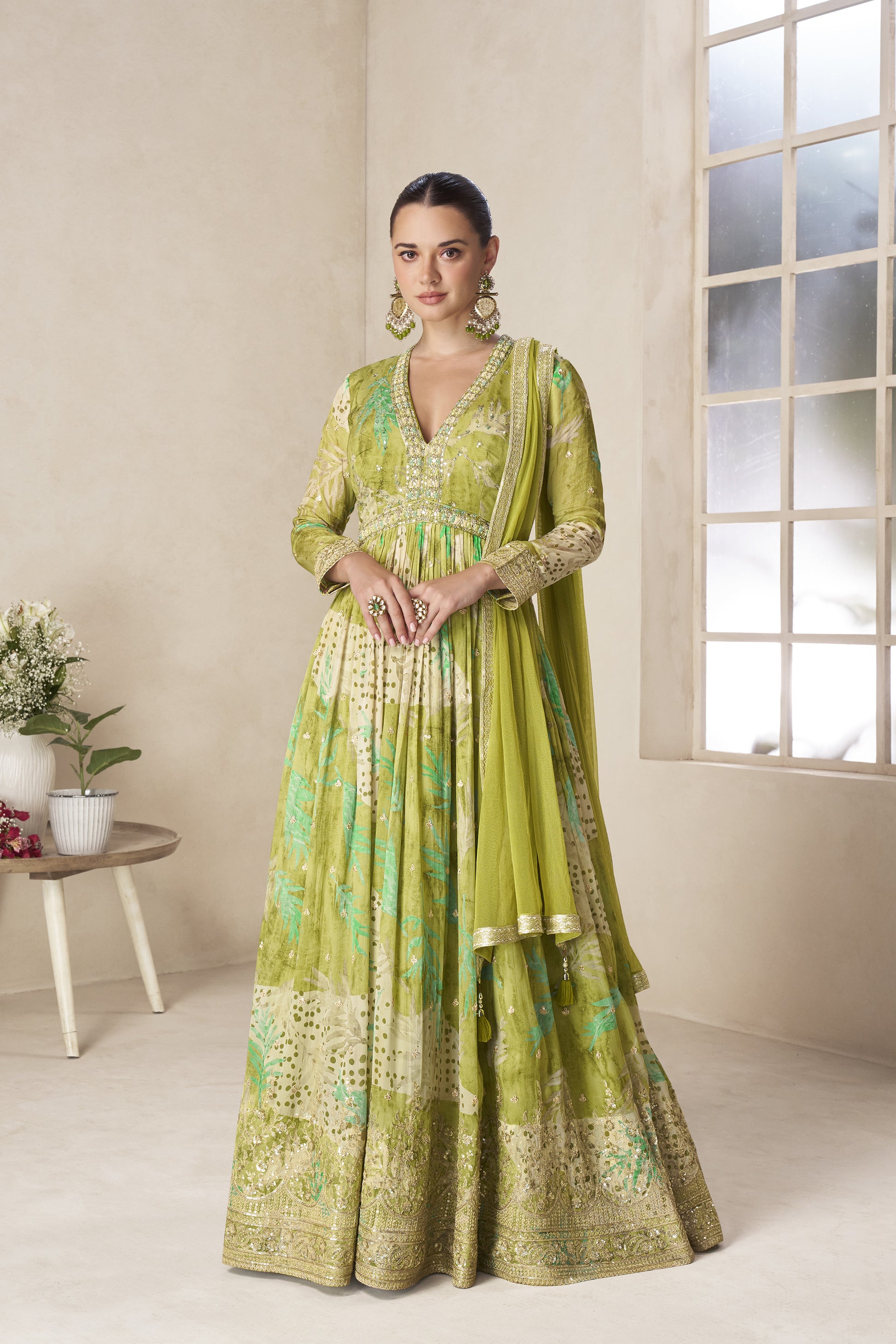 Pistachio green anarkali gown full front view with heavy embroidery