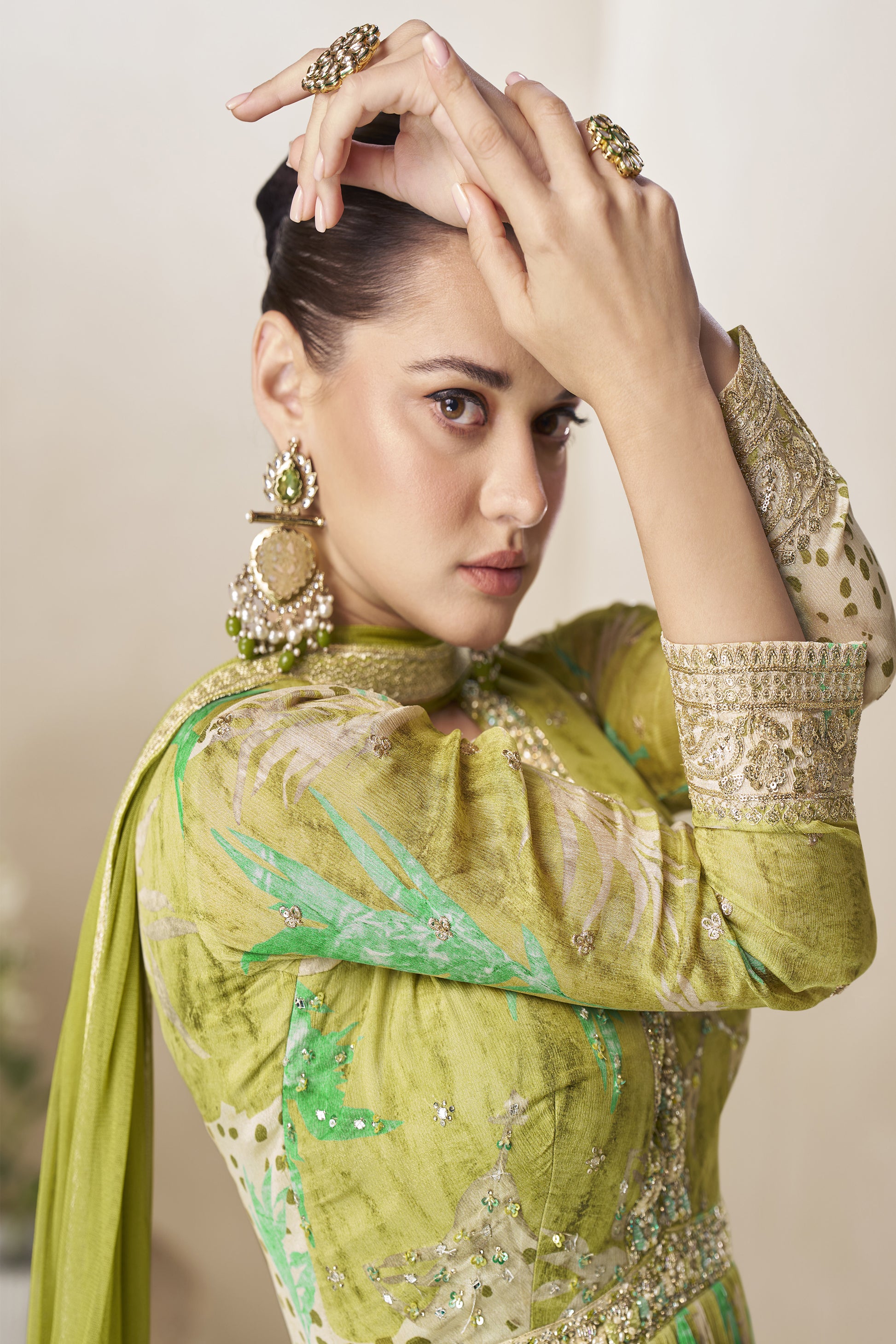 Close-up of heavy embroidery work on pistachio green anarkali suit
