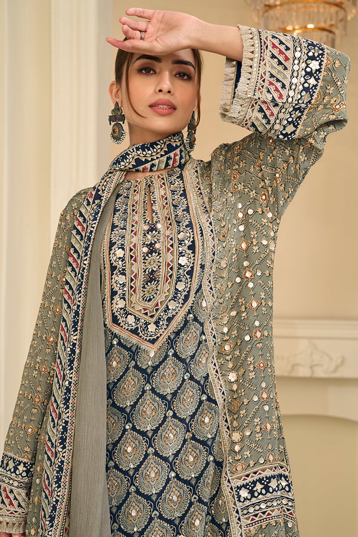 Matching pistachio green dupatta displayed with palazzo pants