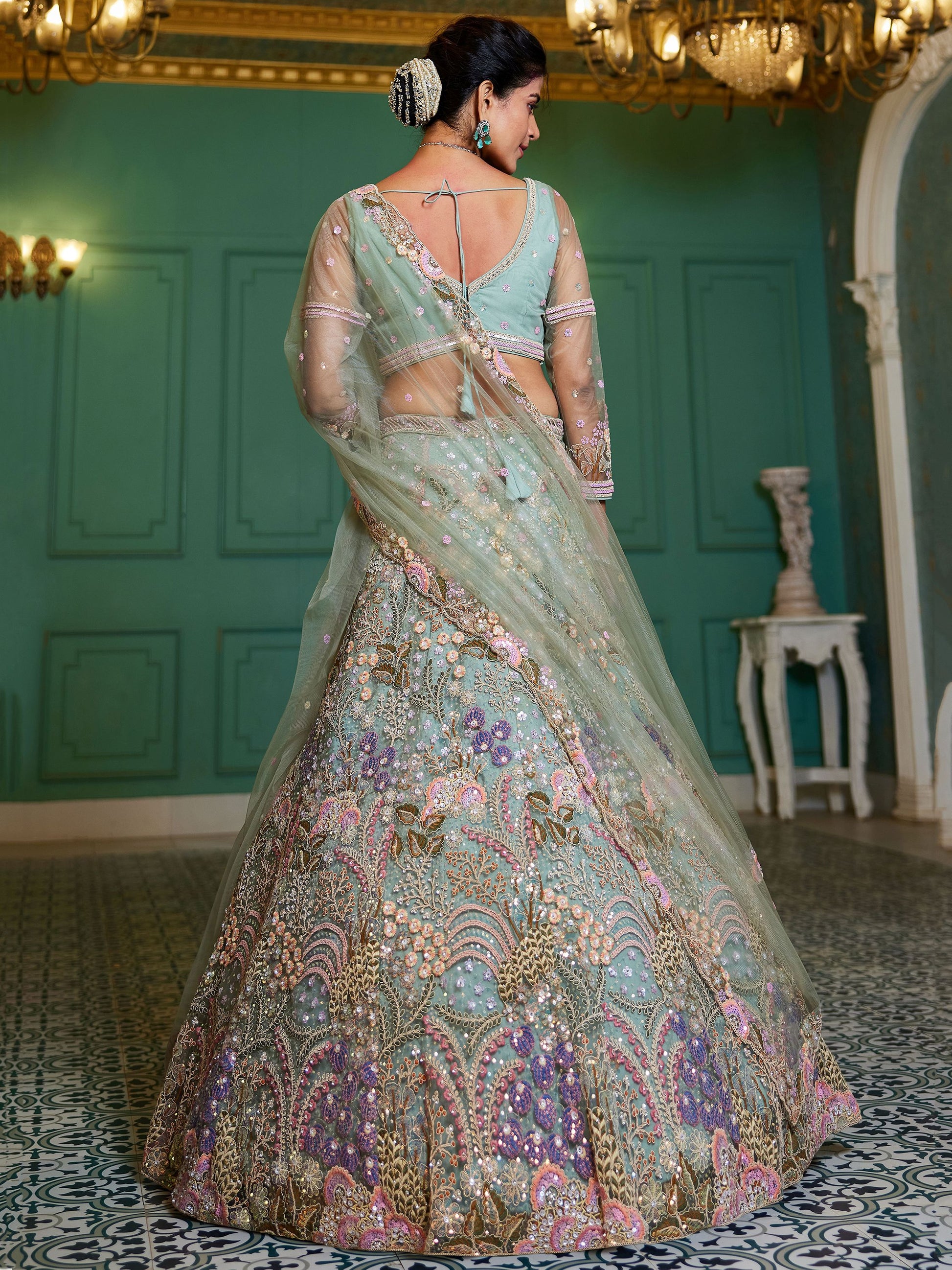 Back view of pistachio green lehenga choli design