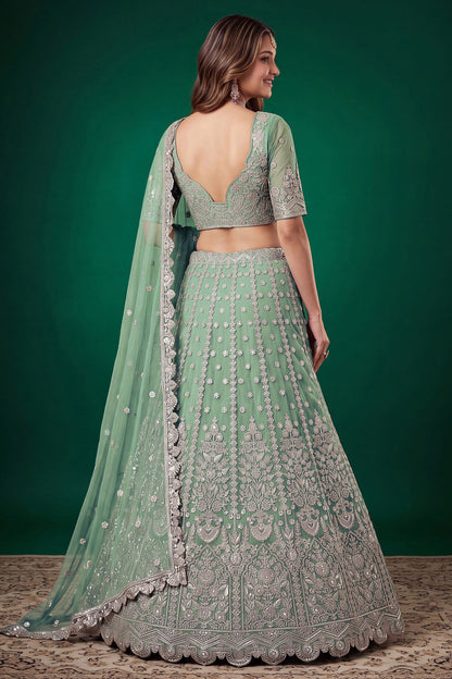 Back view of pistachio green lehenga choli with embroidery