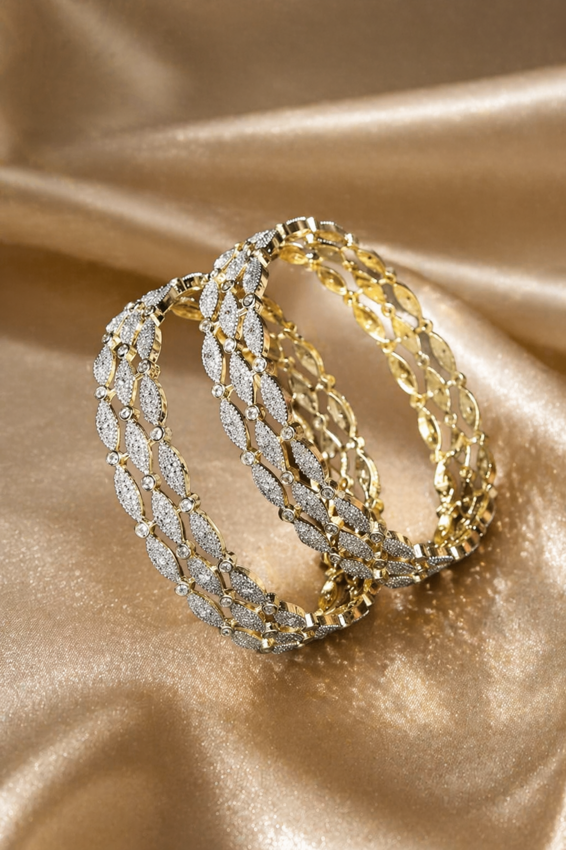 polished gold bracelet on soft fabric background