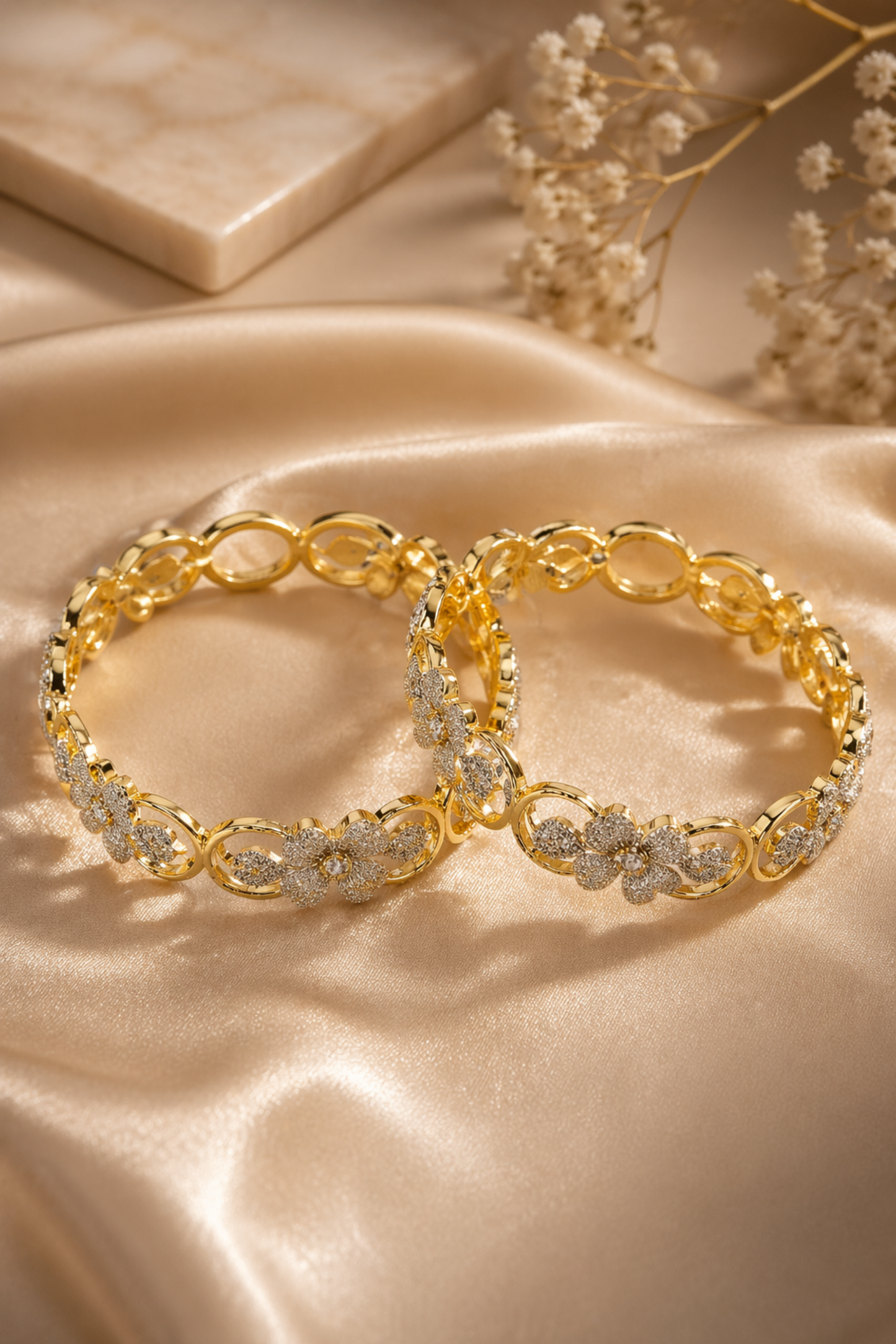 simple gold bracelet with repeating surface pattern