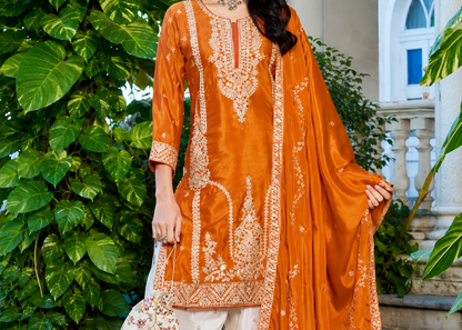 Model Wearing Orange Wide Leg Pants For Wedding Event