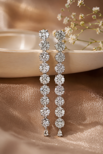 luxury white gold dangle earrings on silk
