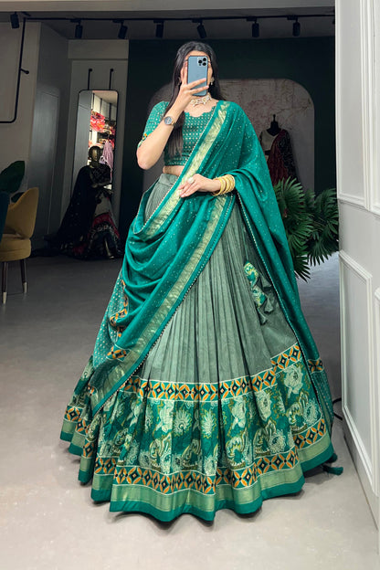 Model wearing green lehenga at evening celebration