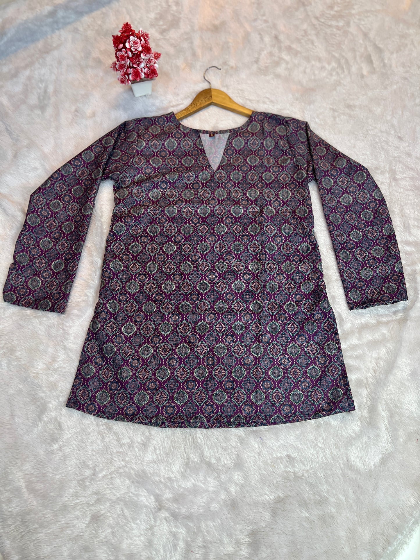 Purple tunic paired for date-ready casual outfit
