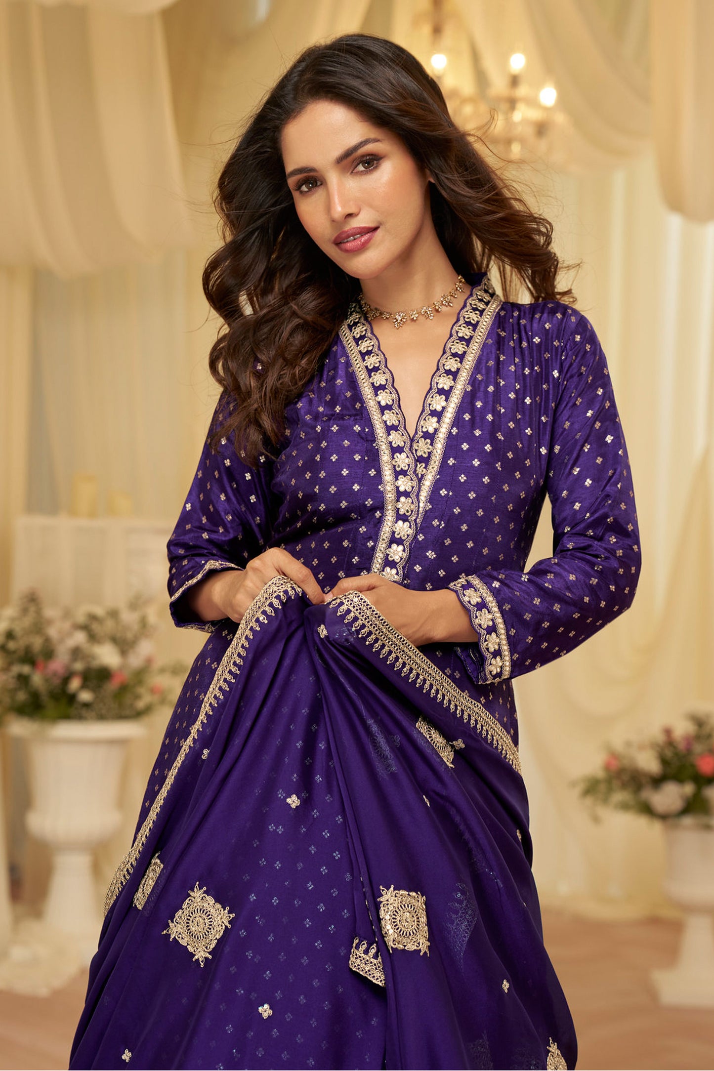 Full-length view of purple anarkali suit with matching dupatta