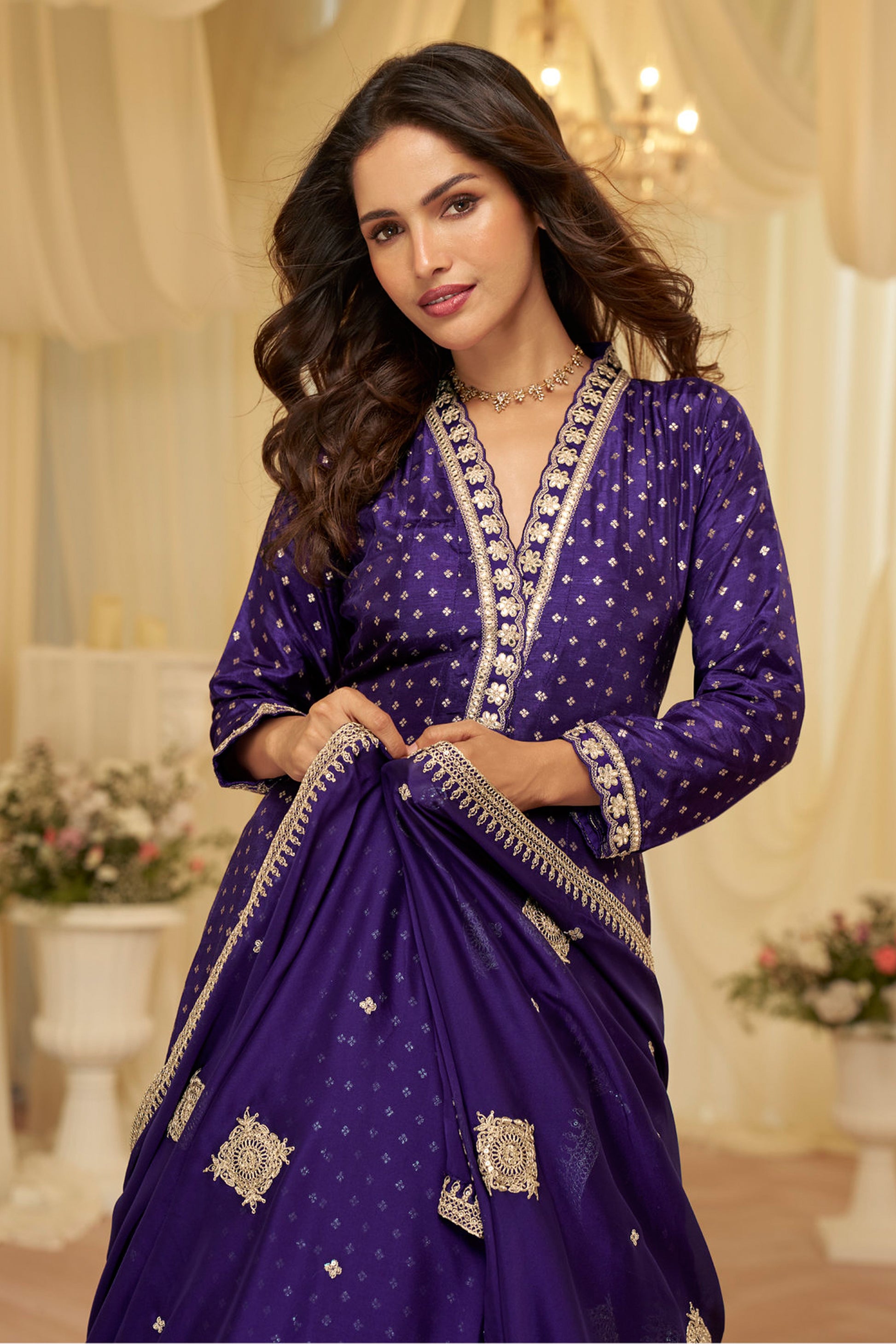 Full-length view of purple anarkali suit with matching dupatta