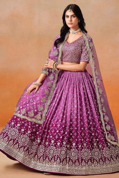 Side view of purple ghagra choli with intricate detailing