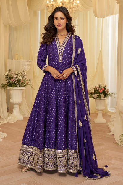Front view of purple Indian anarkali gown with heavy embroidery