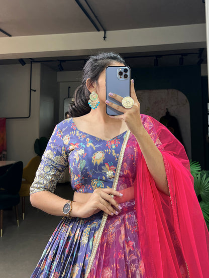 thread and zari work close-up on purple indian dress
