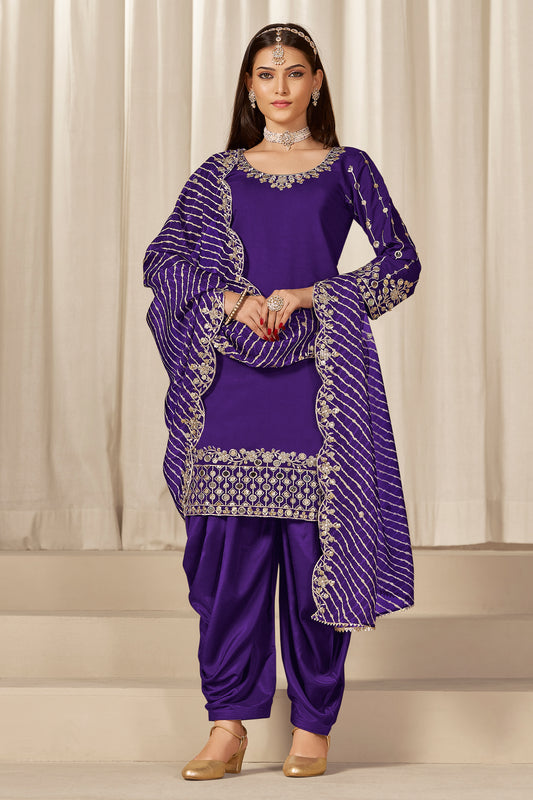 Front view of purple patiala salwar suit with embroidery and mirror work