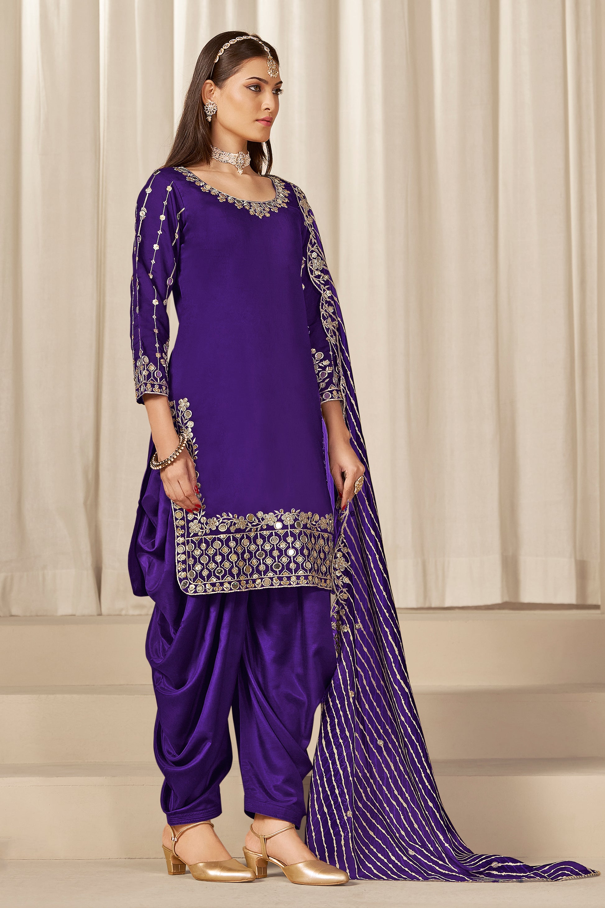 Sleeve detail of purple patiala salwar suit