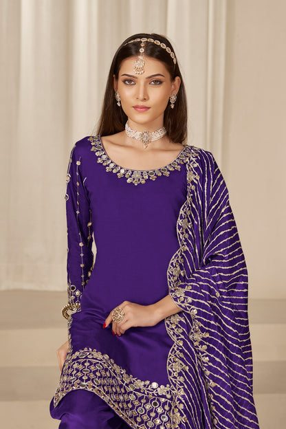Close-up of embroidery on Roman silk top of purple patiala