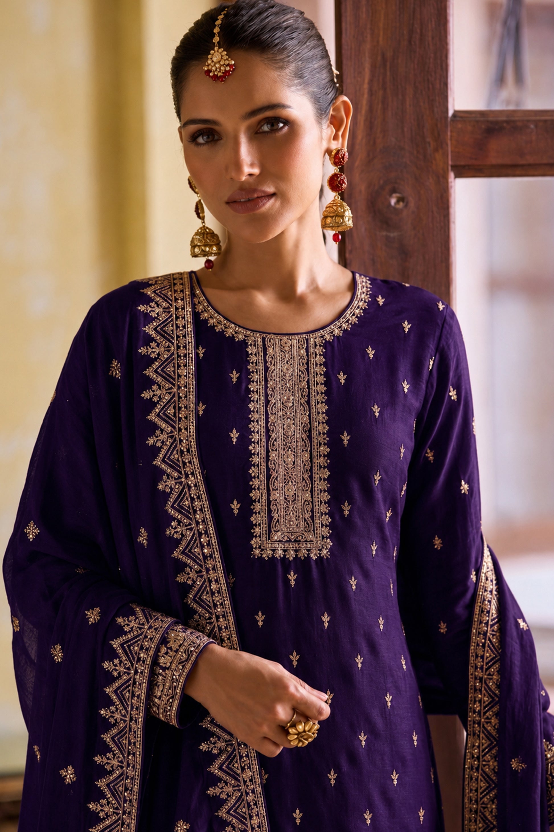 Purple Salwar Kameez with traditional embroidery work