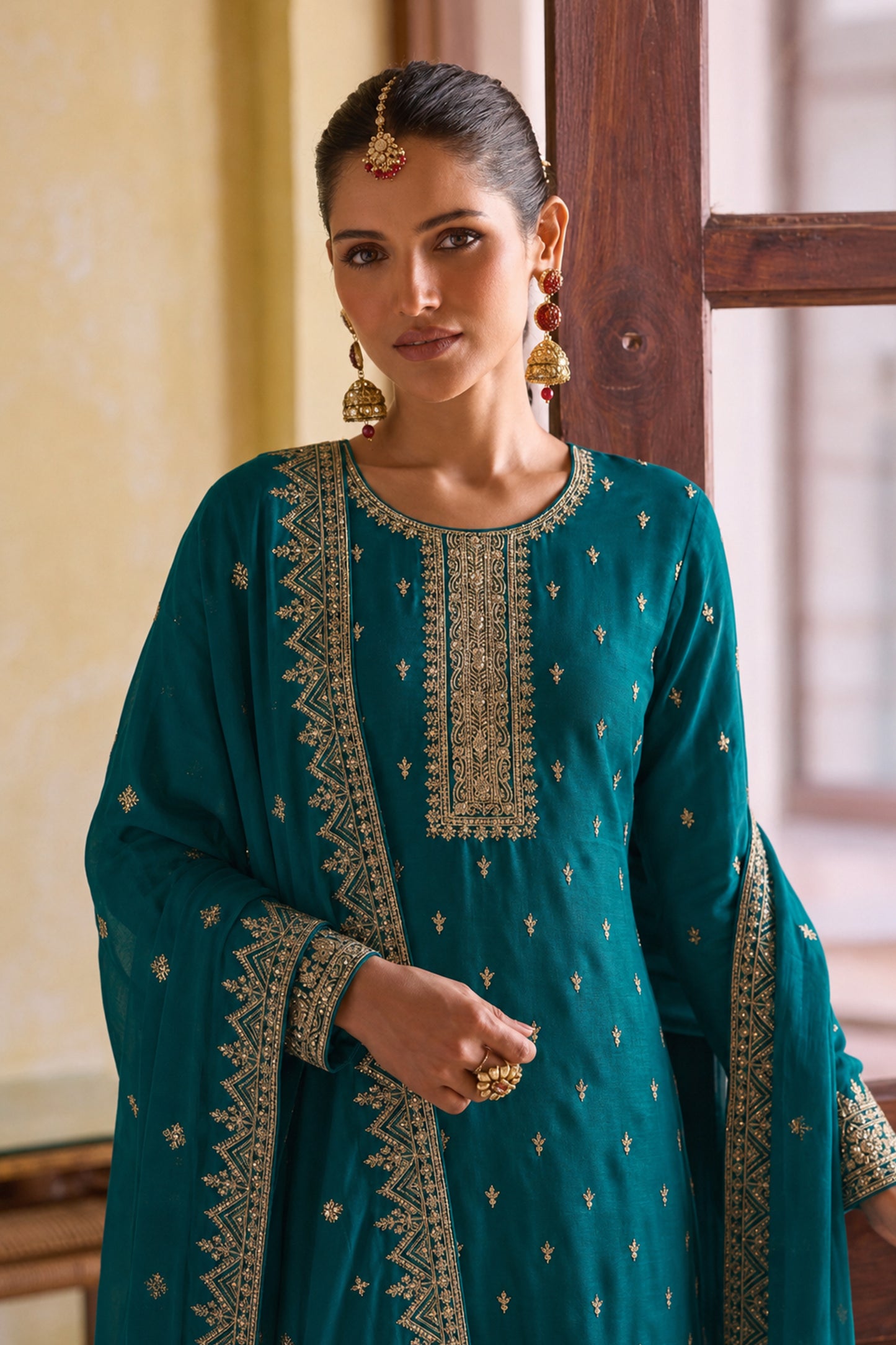 Front view of Teal Green Salwar Kameez for reception styling