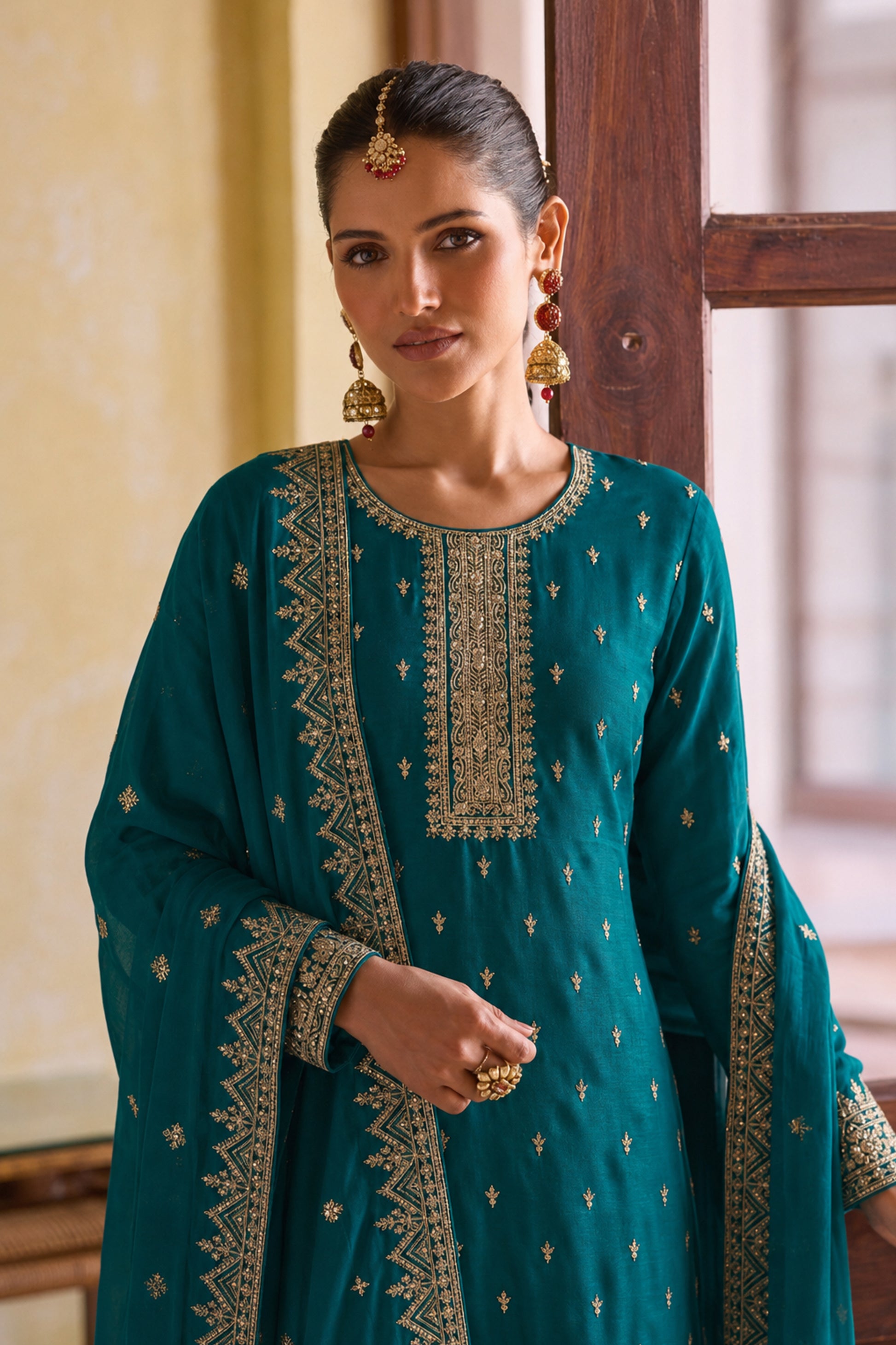 Front view of Teal Green Salwar Kameez for reception styling