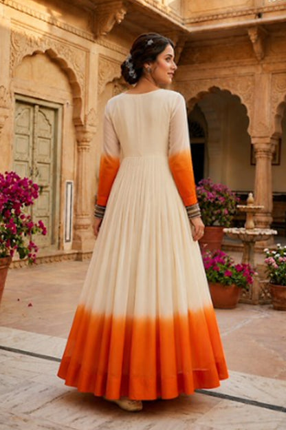 Orange Traditional Gown shown for party wear