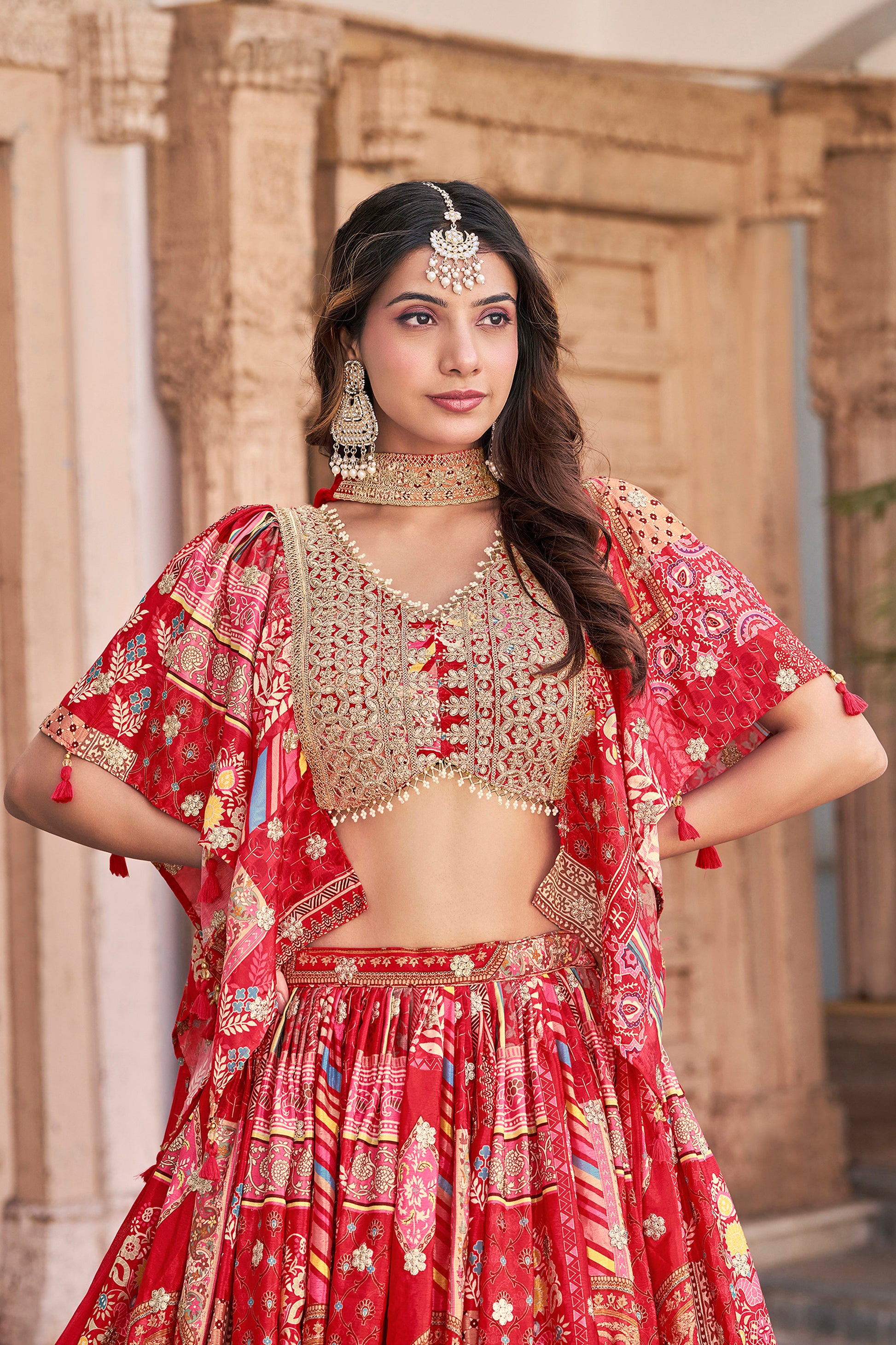 close view of red Chinnon Silk lehenga choli texture