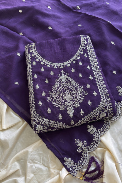 Detail view of thread sequin embroidery on silk salwar kameez