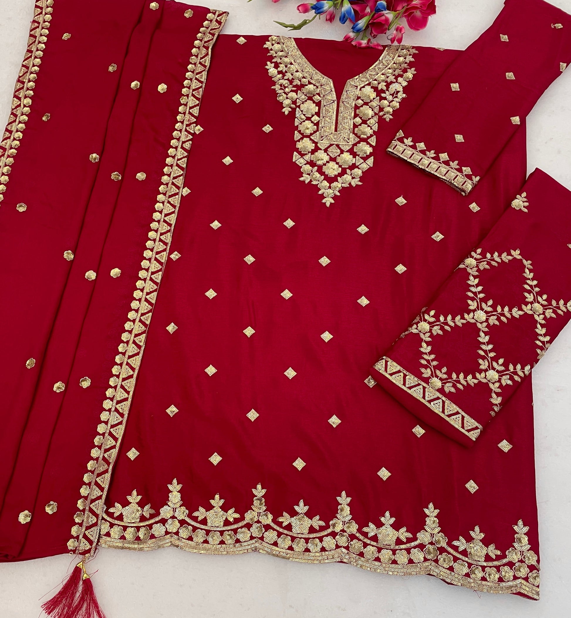 Women wearing dark red Chinon palazzo style outfit