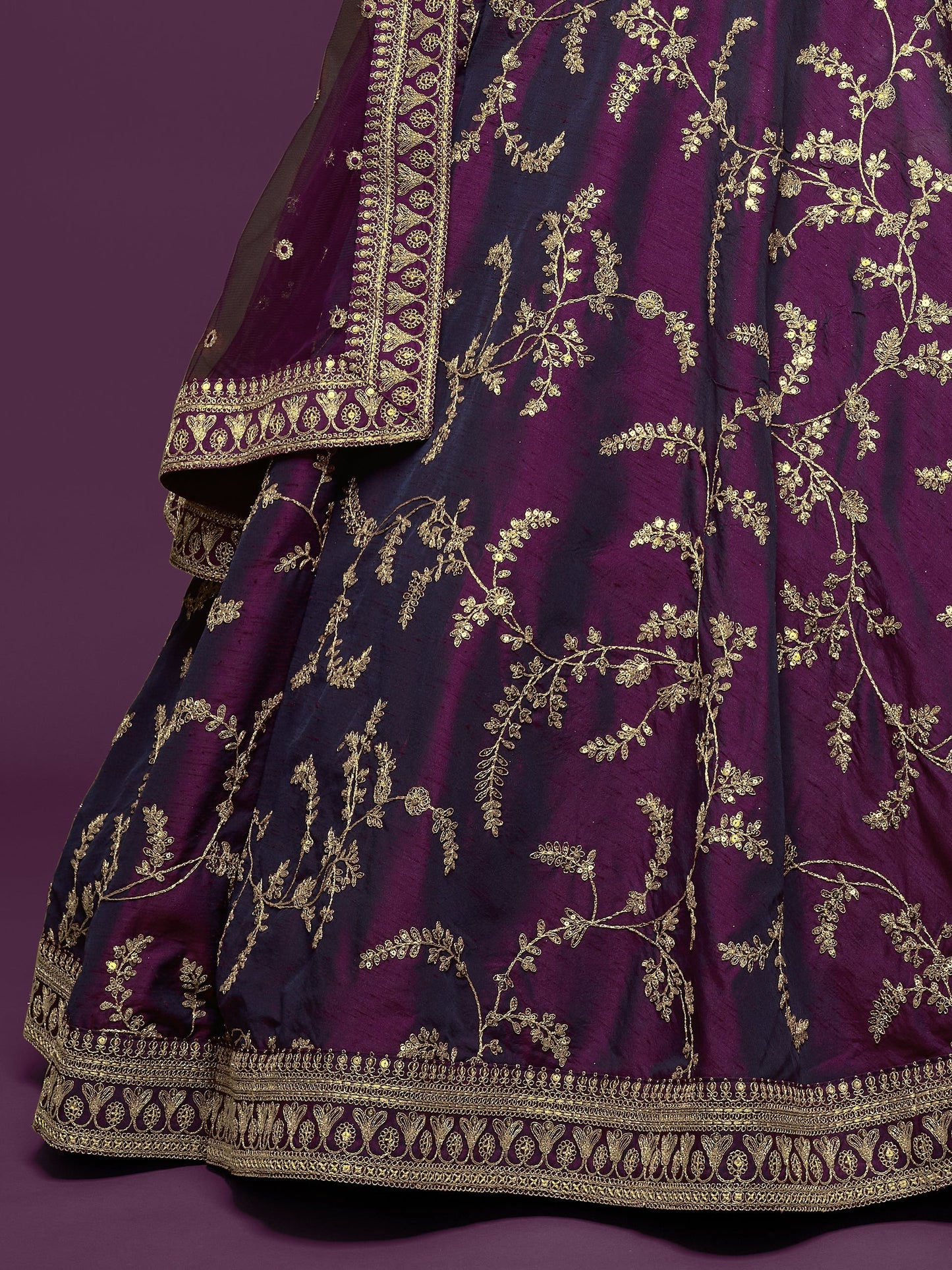 Sequins highlights under lighting on reception lehenga