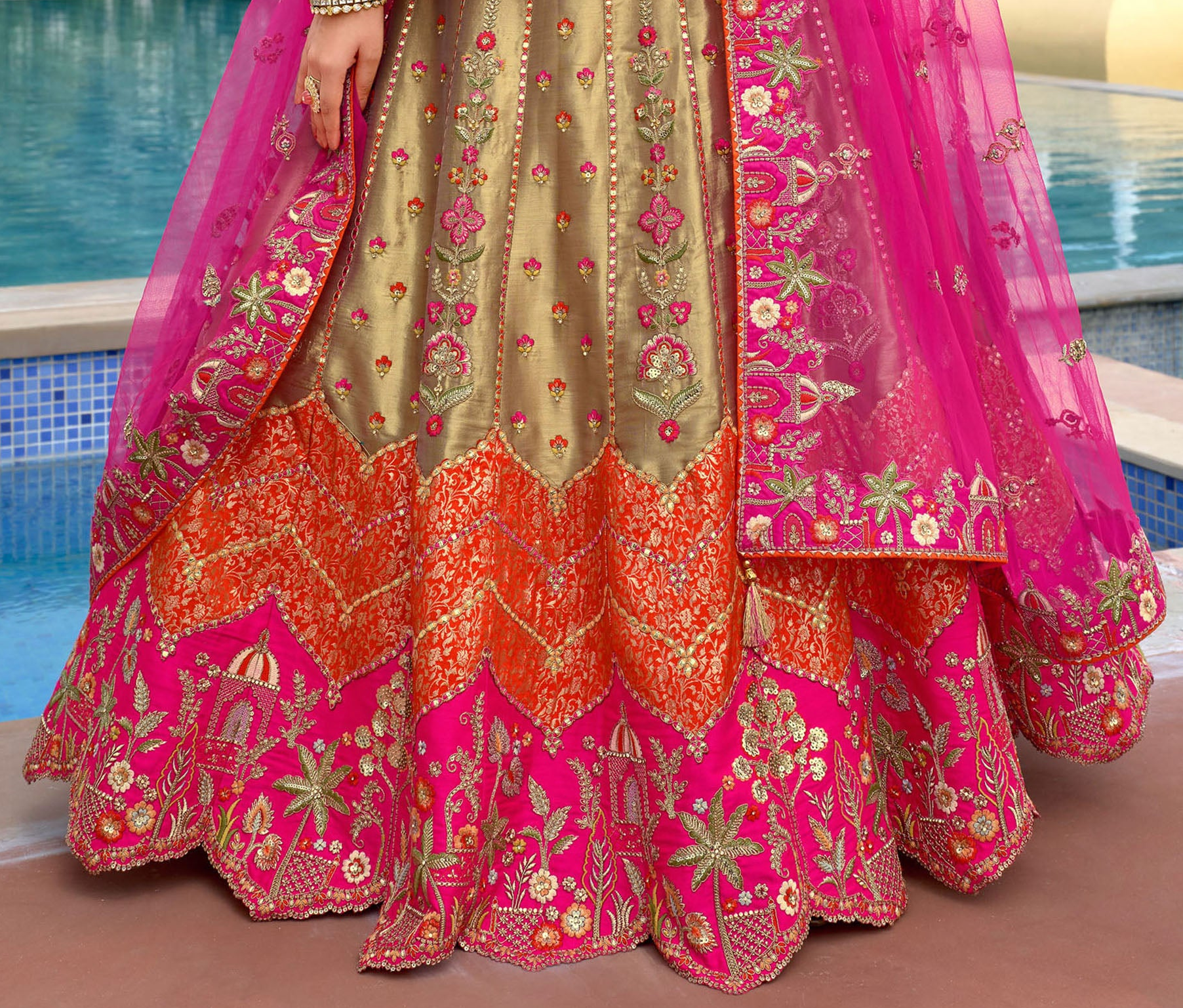Pink lehenga close-up of embroidered mirror detailing
