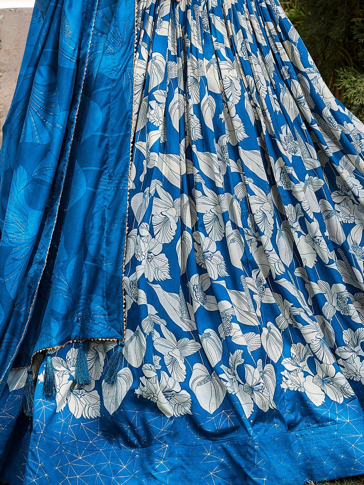 Blue lehenga choli silhouette with embroidery highlights
