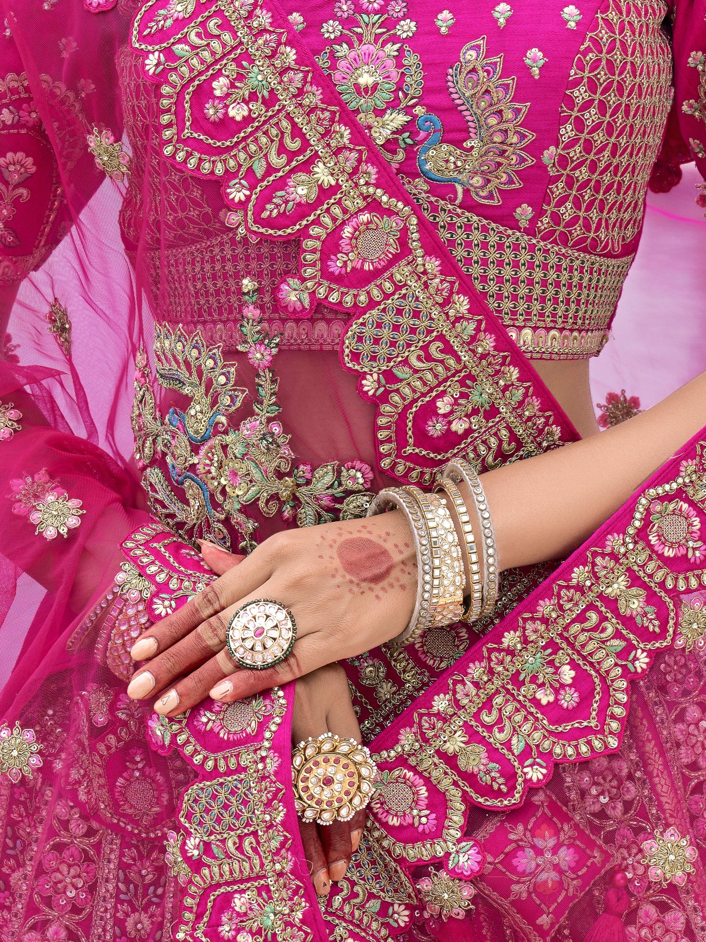 Styled reception look featuring pink lehenga choli
