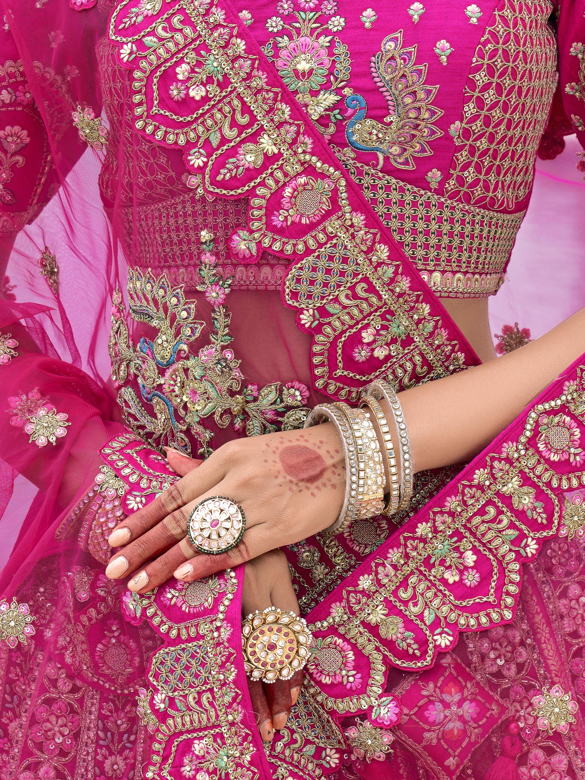 Styled reception look featuring pink lehenga choli